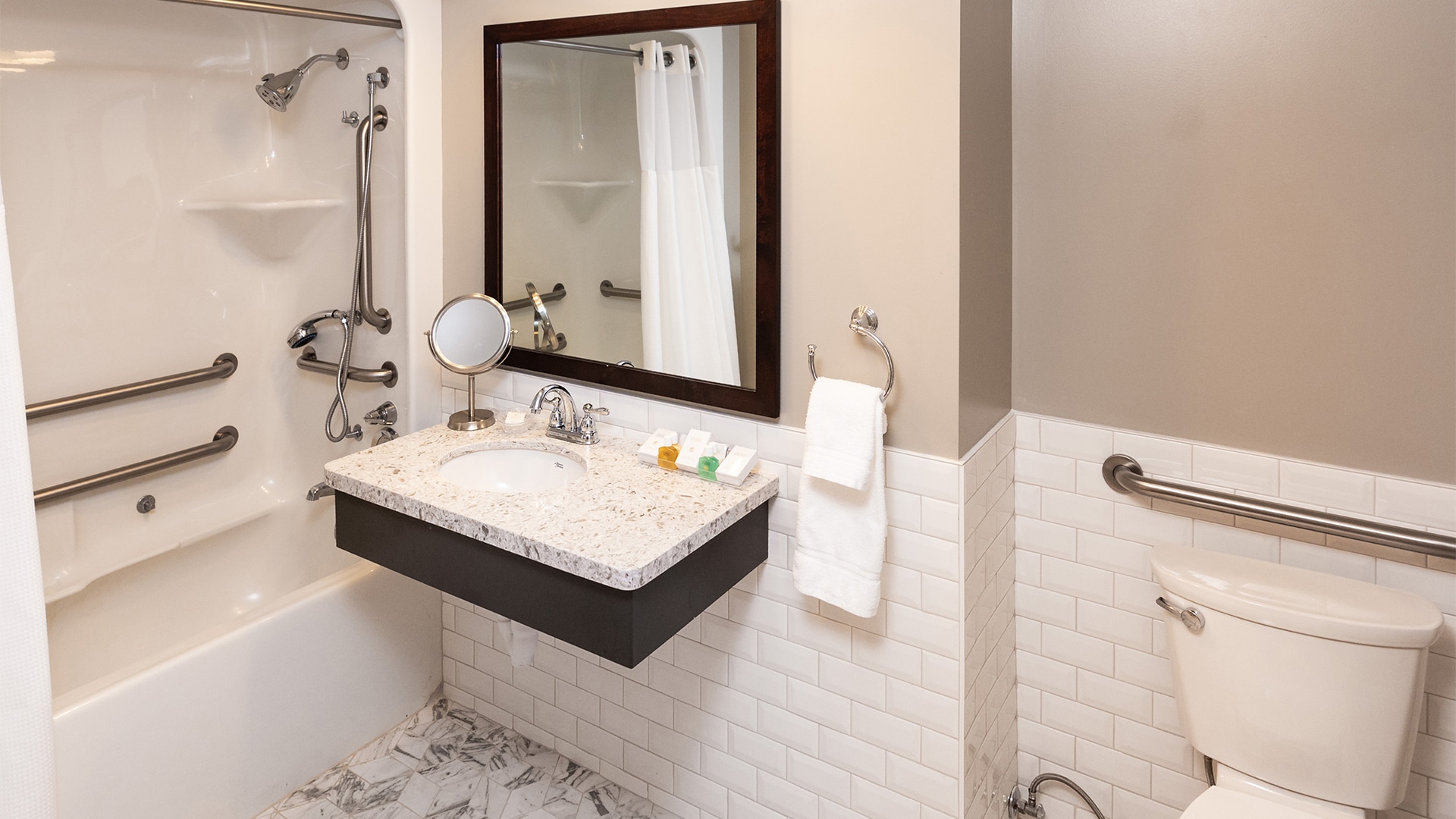 a bathroom with a mirror and a sink