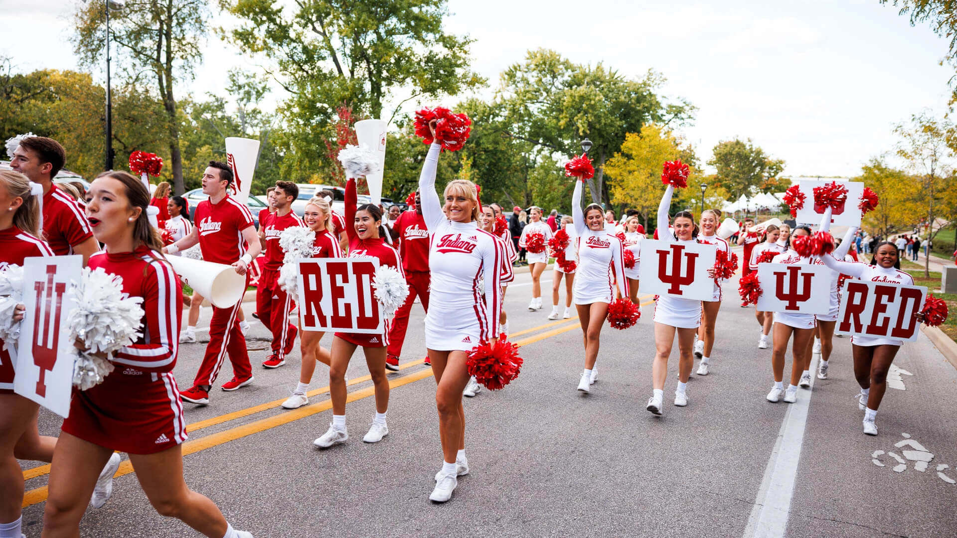 a group of cheerleaders in a parade