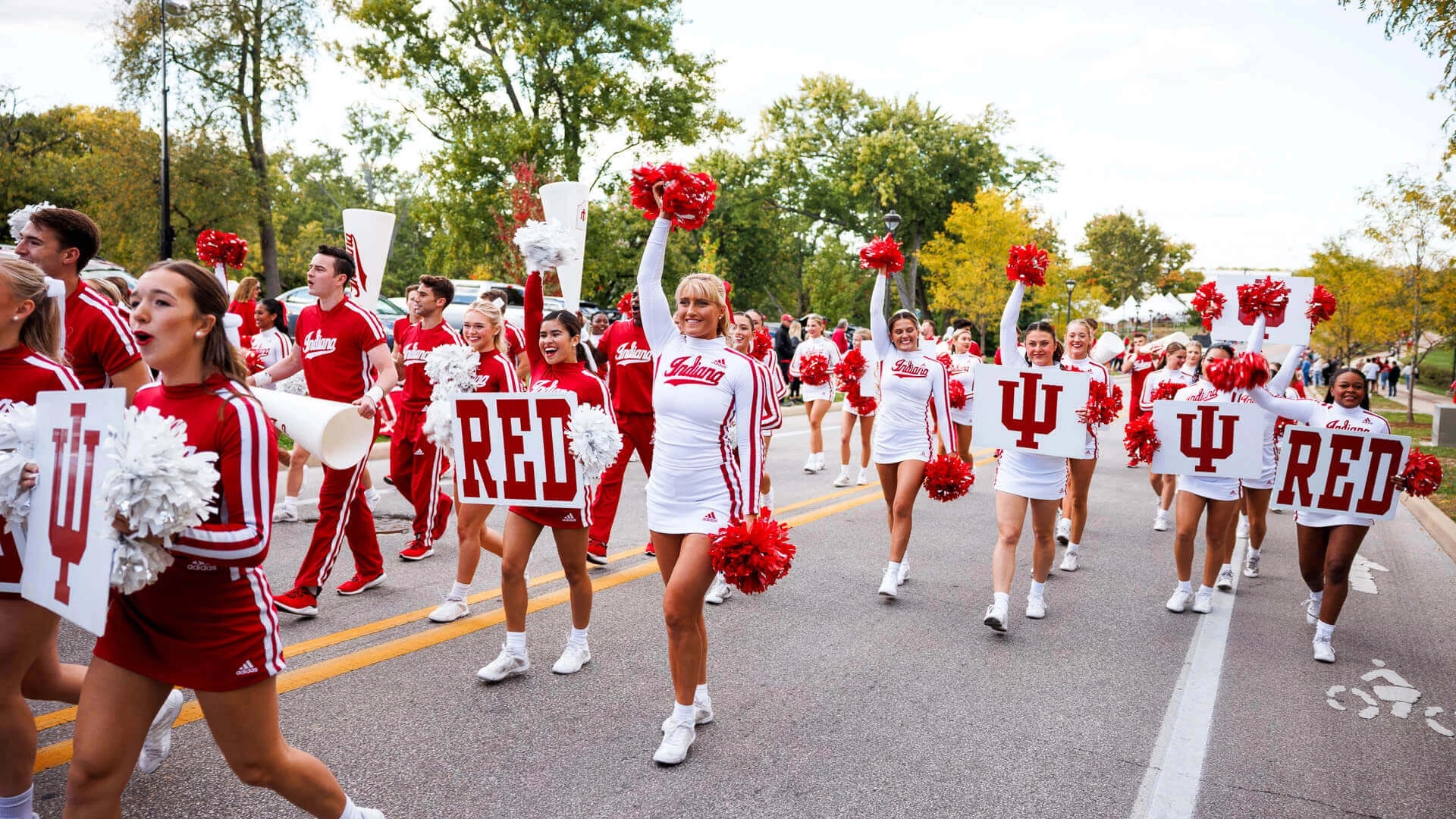 a group of cheerleaders in a parade