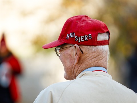a man wearing a red hat