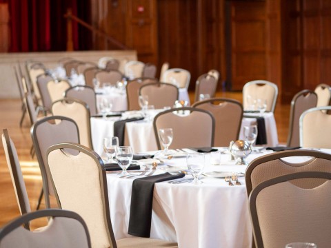 a group of tables set up in a room