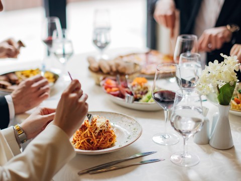 a group of people eating at a table
