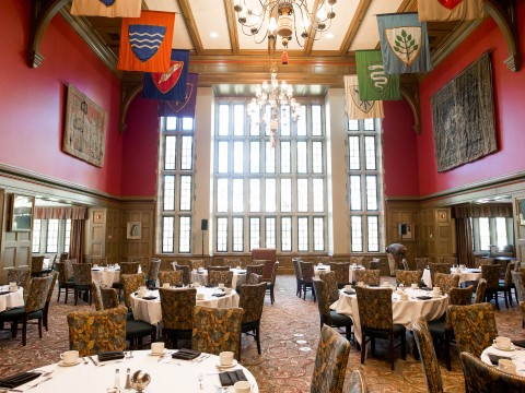 a room with tables and chairs