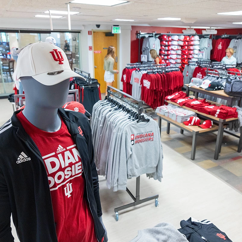 a mannequin wearing a hat in a store
