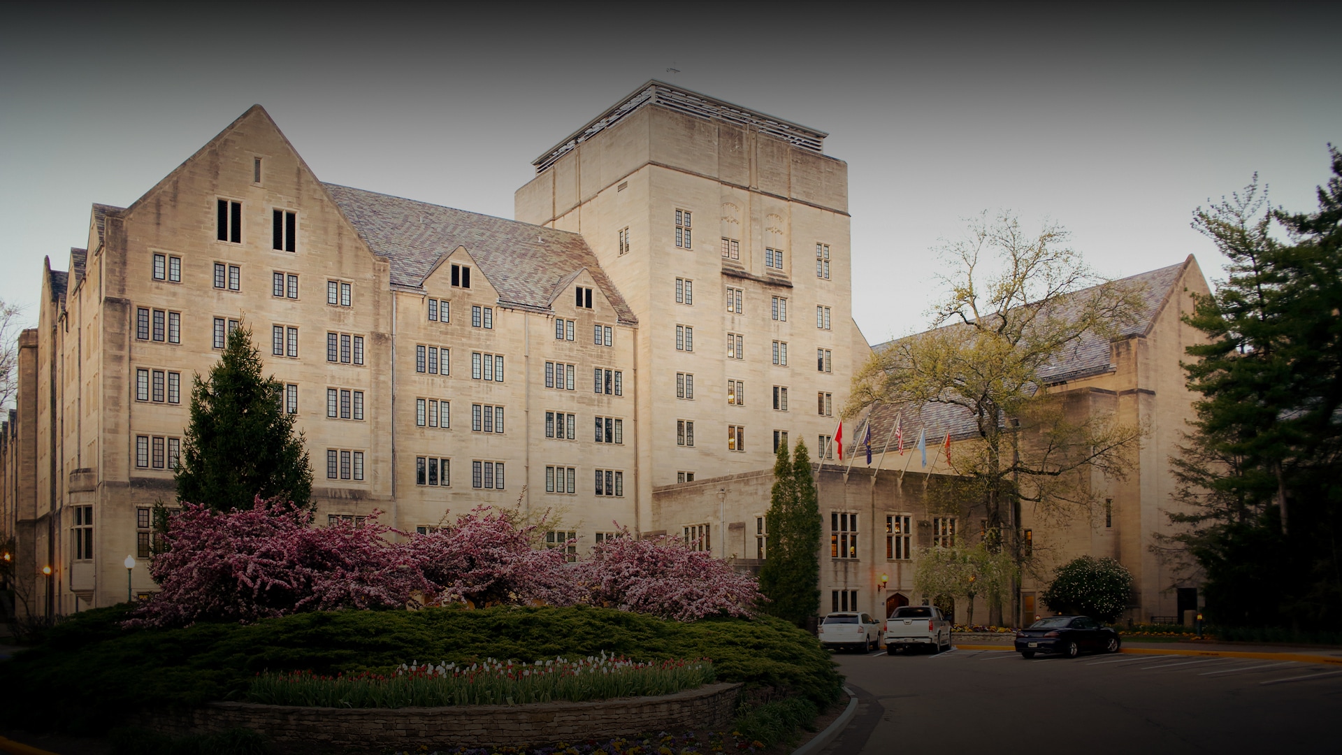a building with trees and bushes