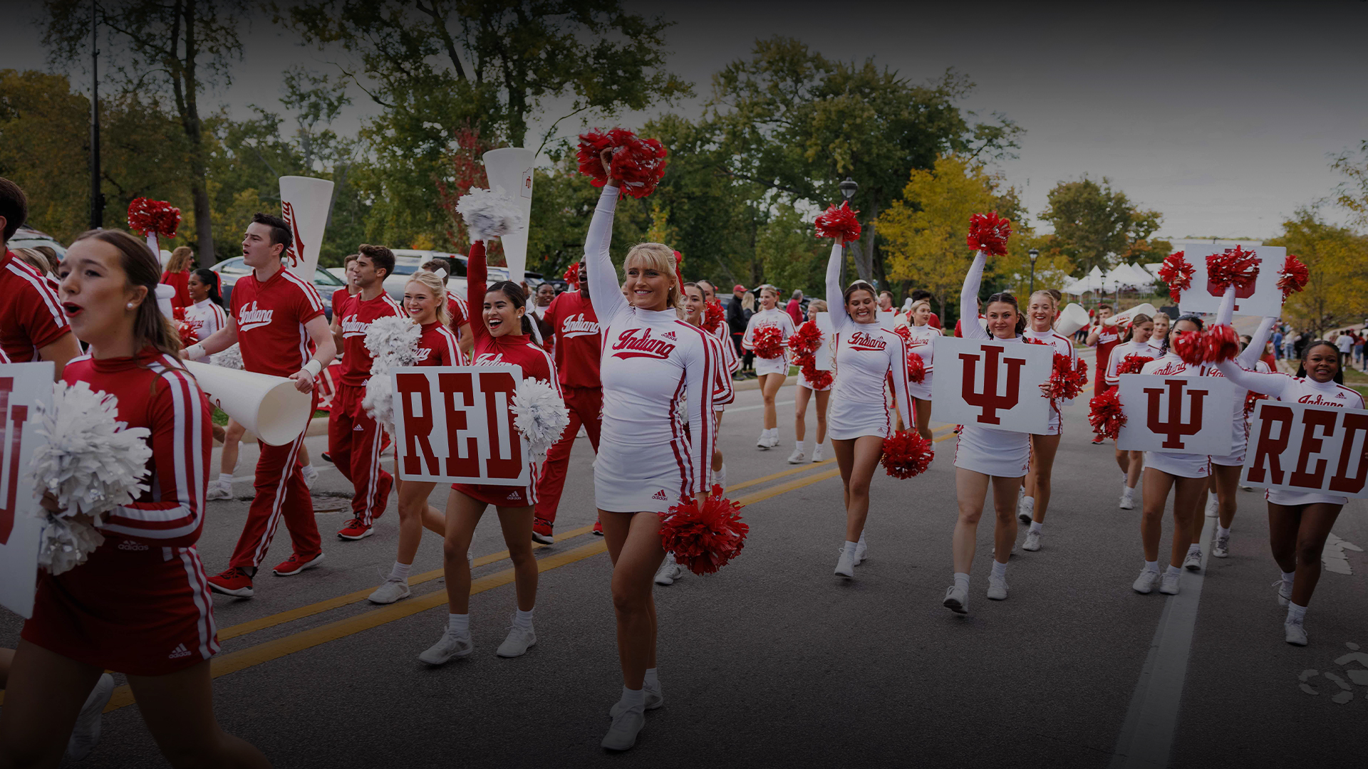 a group of cheerleaders in a parade