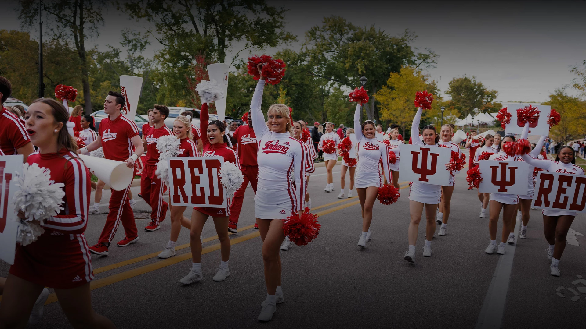 a group of cheerleaders in a parade