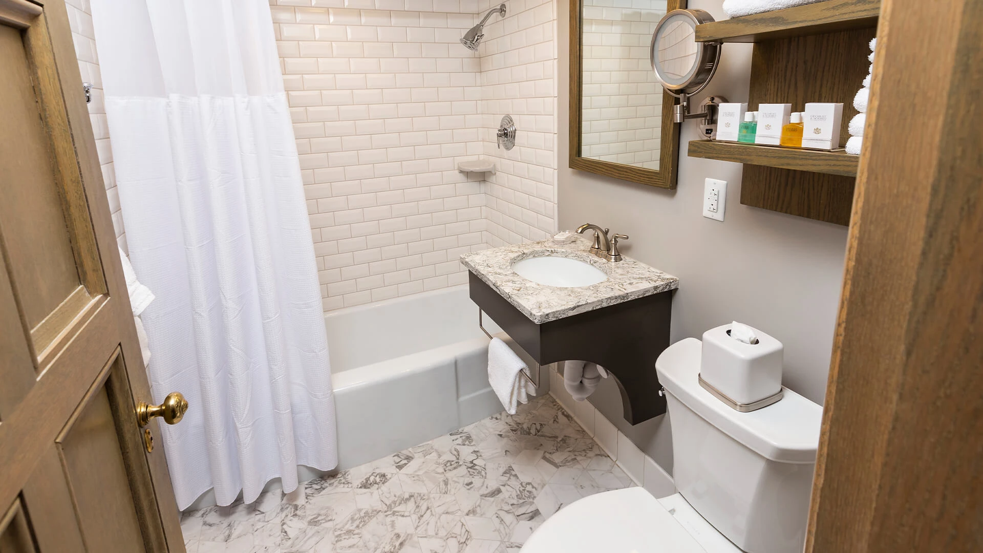 a bathroom with a sink and toilet