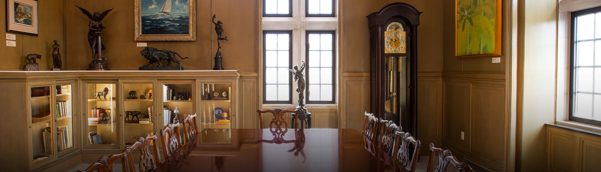 a dining room with a table and chairs