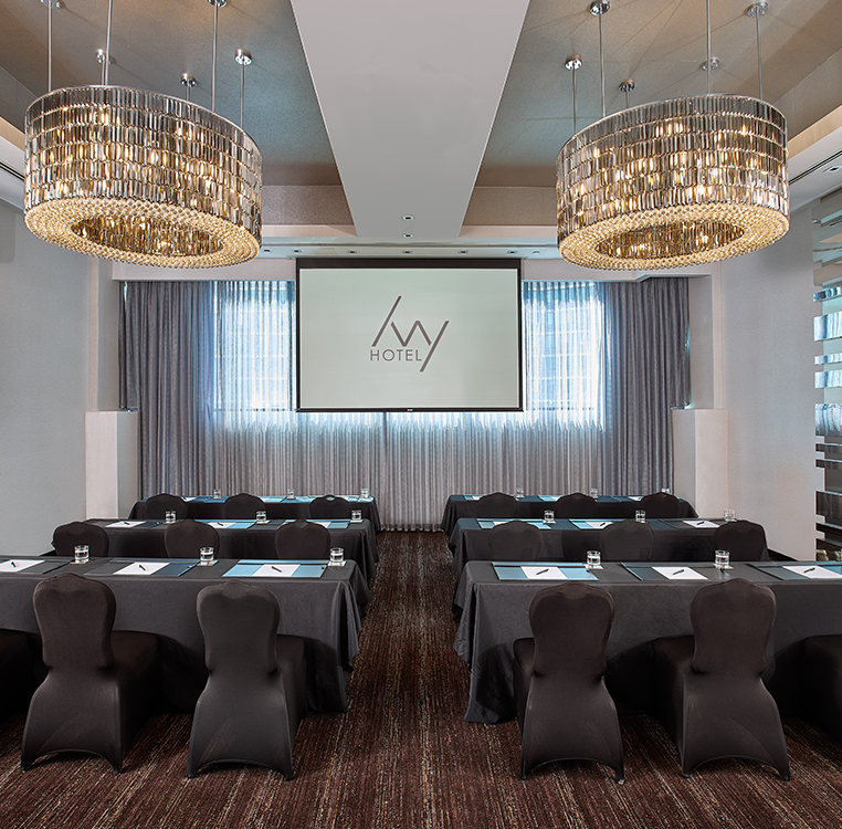 a room with black chairs and tables