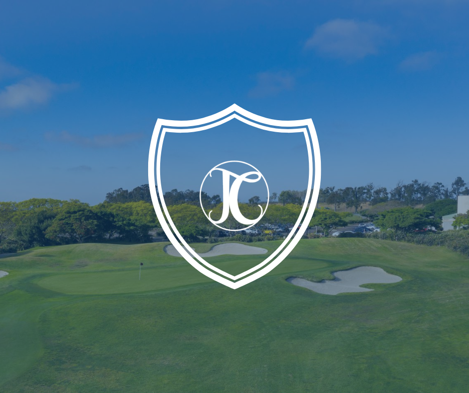 a golf course with a shield on the front