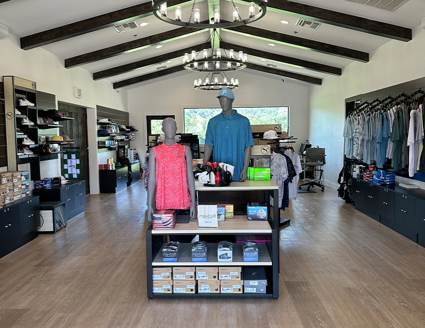 a store with mannequins in front of a store