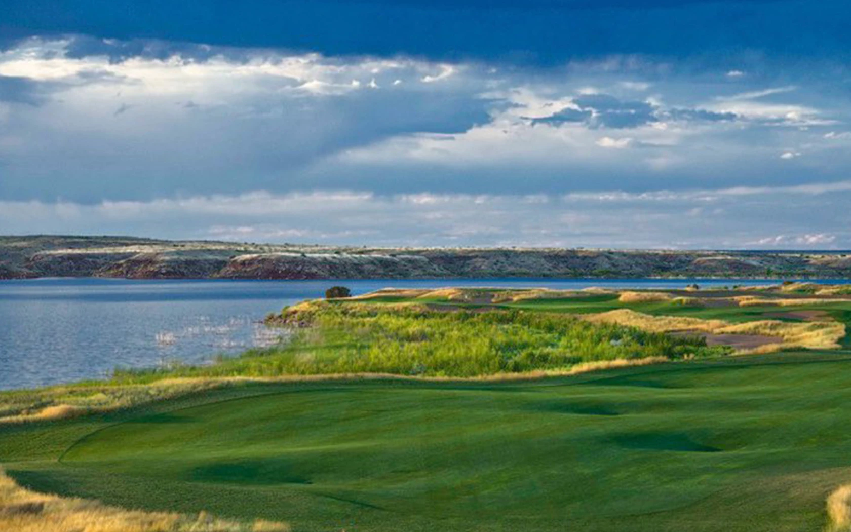the shoreline where the ocean meets the golf course