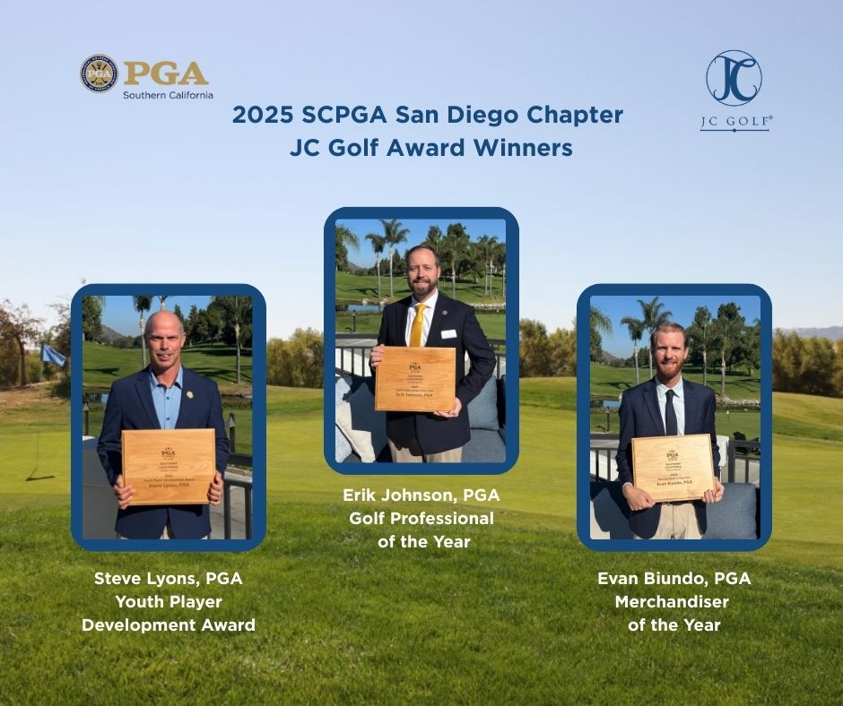 a group of men holding a plaque