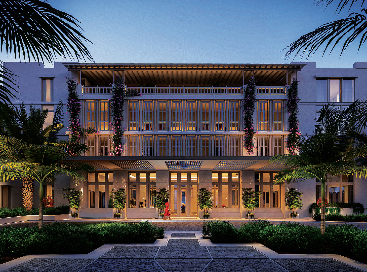 a building with palm trees and a walkway