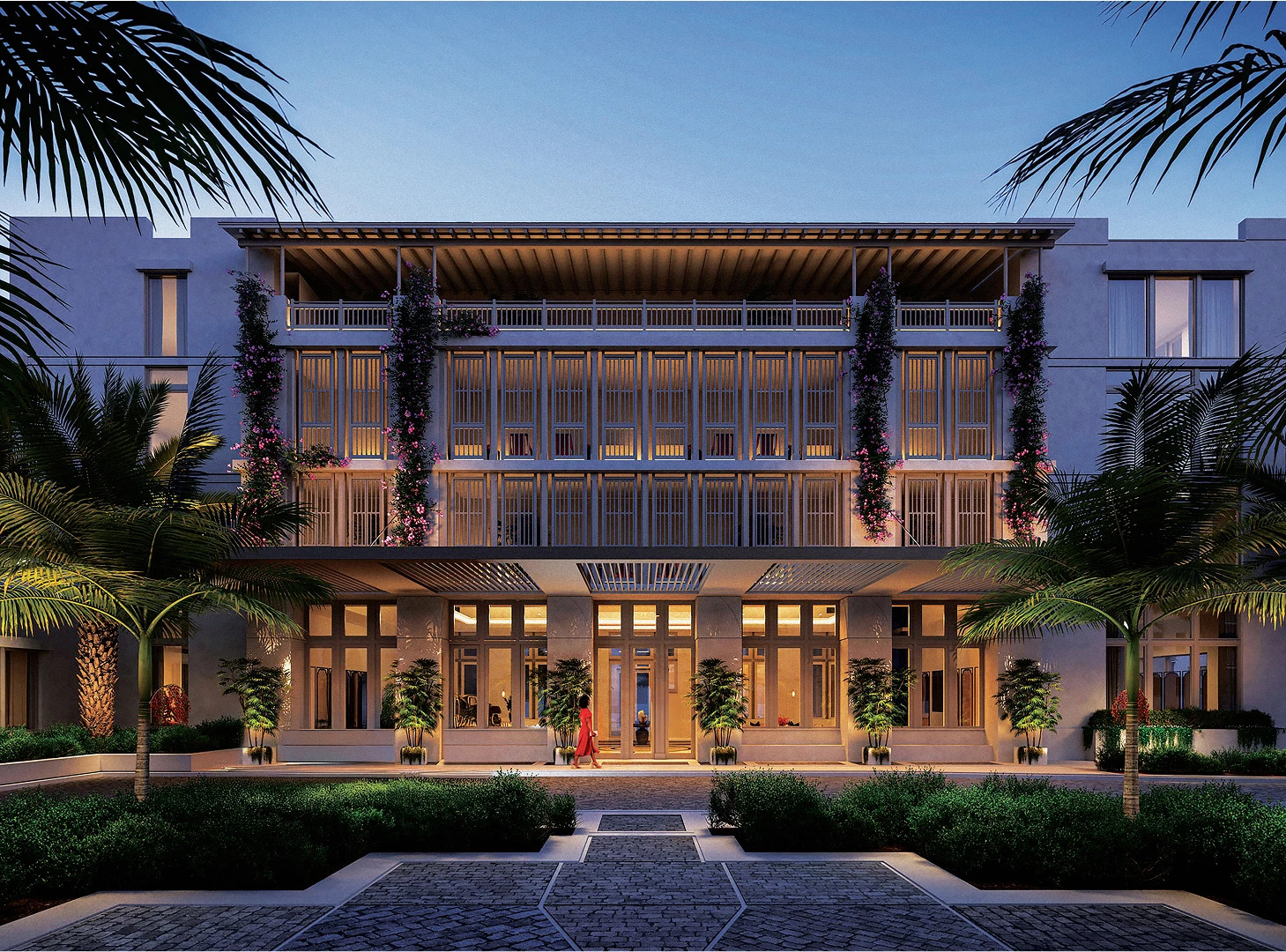 a building with palm trees and a walkway