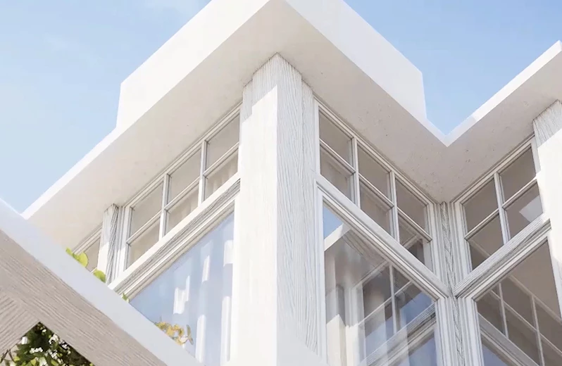 a corner of a building with windows
