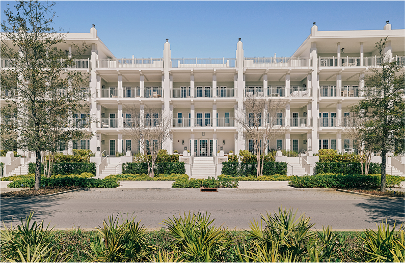a white building with many balconies