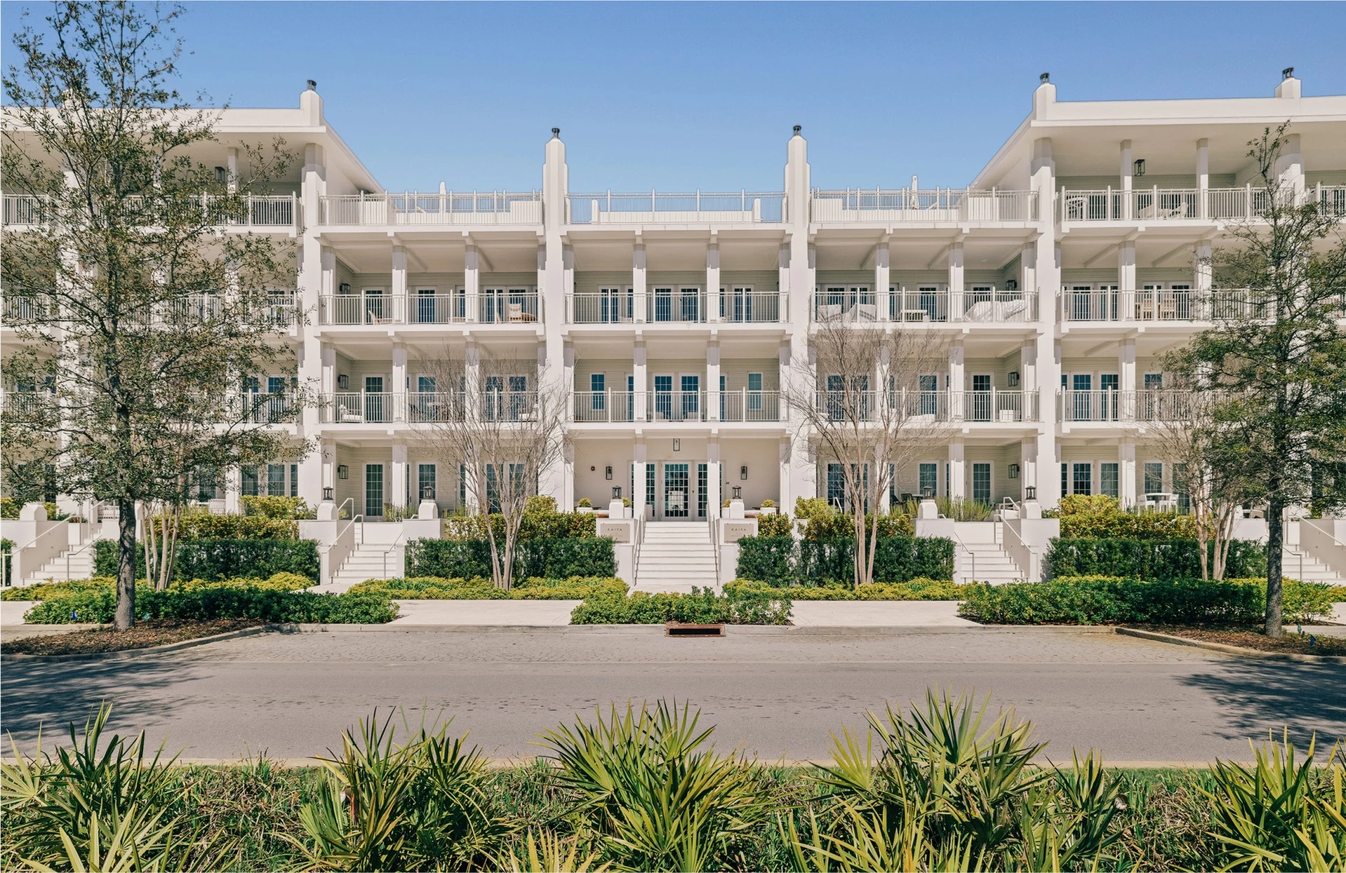 a white building with many balconies