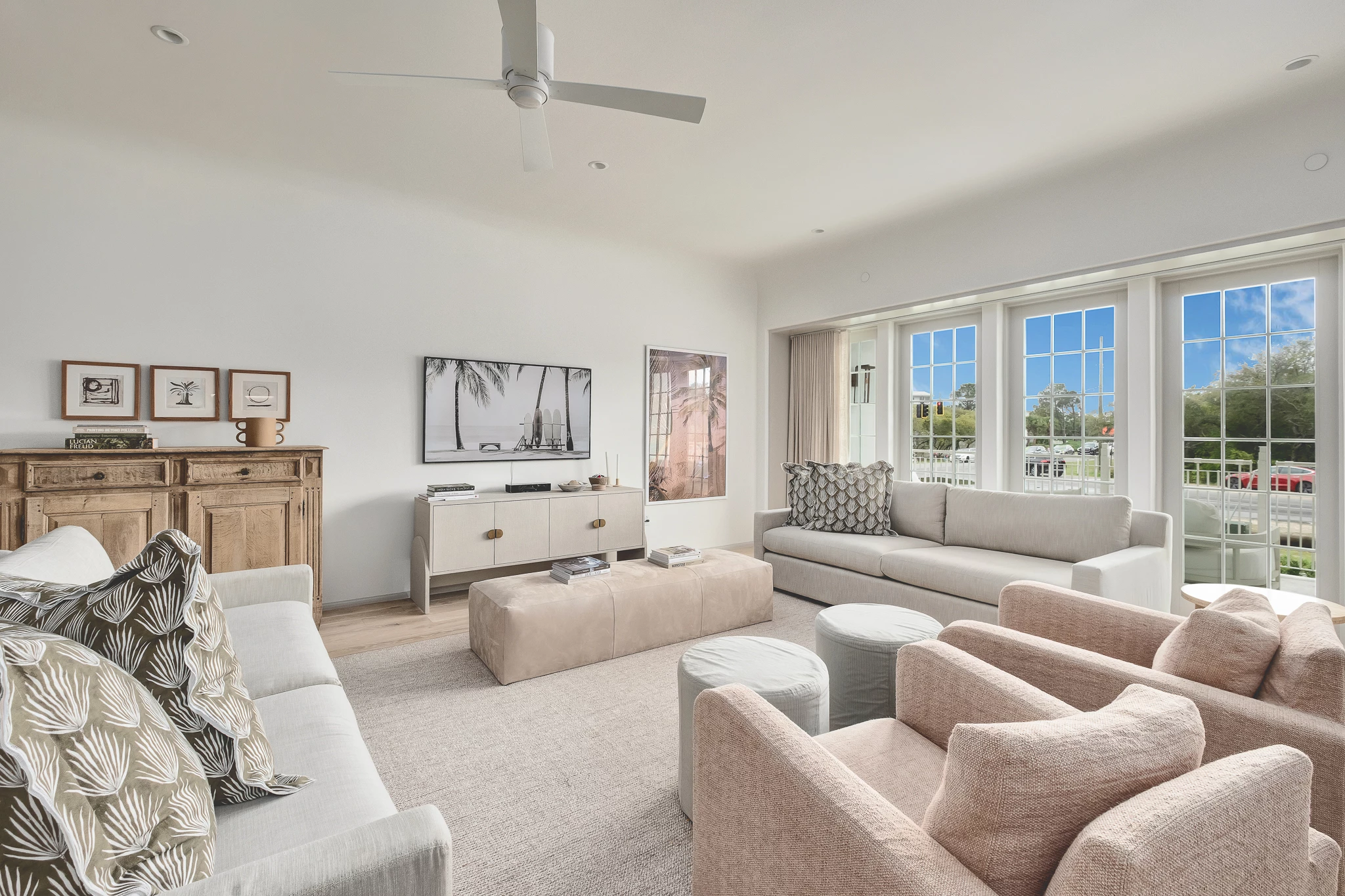 a living room with couches and chairs