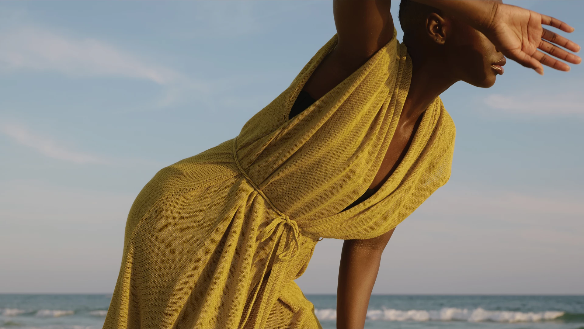 a woman in a yellow dress