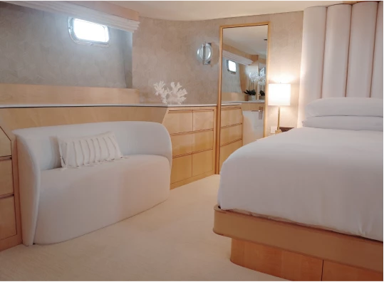 a hotel room with a bed and a couch