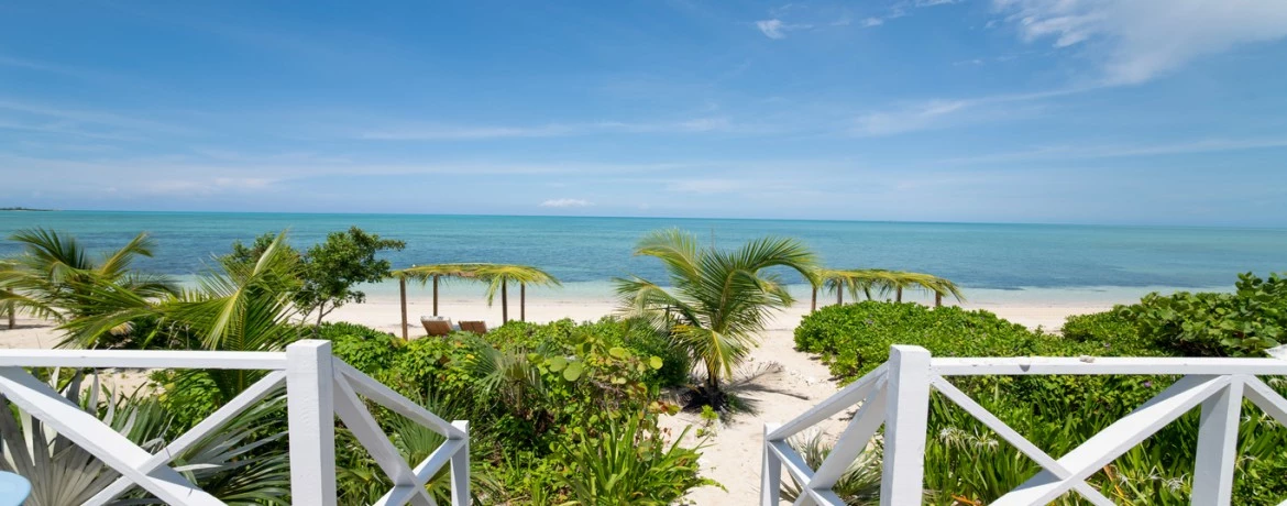 a deck overlooking a beach