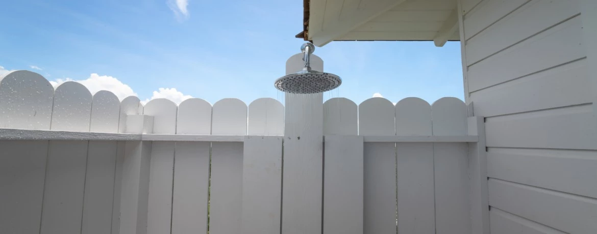 a white building with a bell