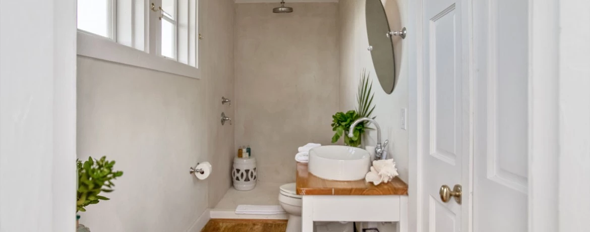 a bathroom with a sink and toilet