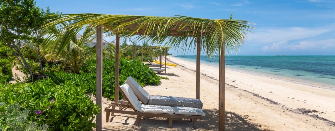 a lounge chair on a beach