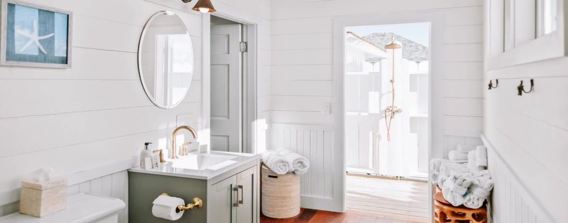a bathroom with a mirror and sink