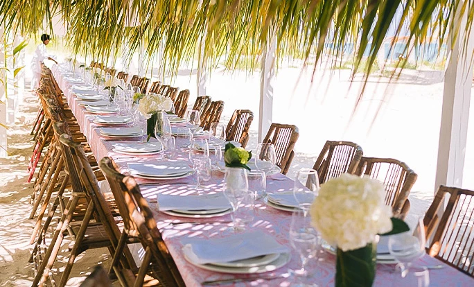 a table and chairs on a deck
