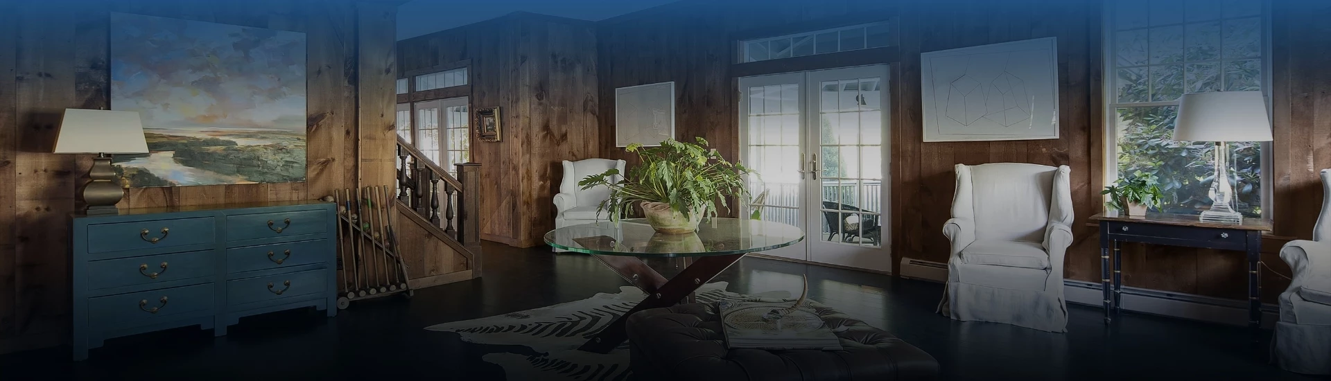 a room with a glass table and a chair