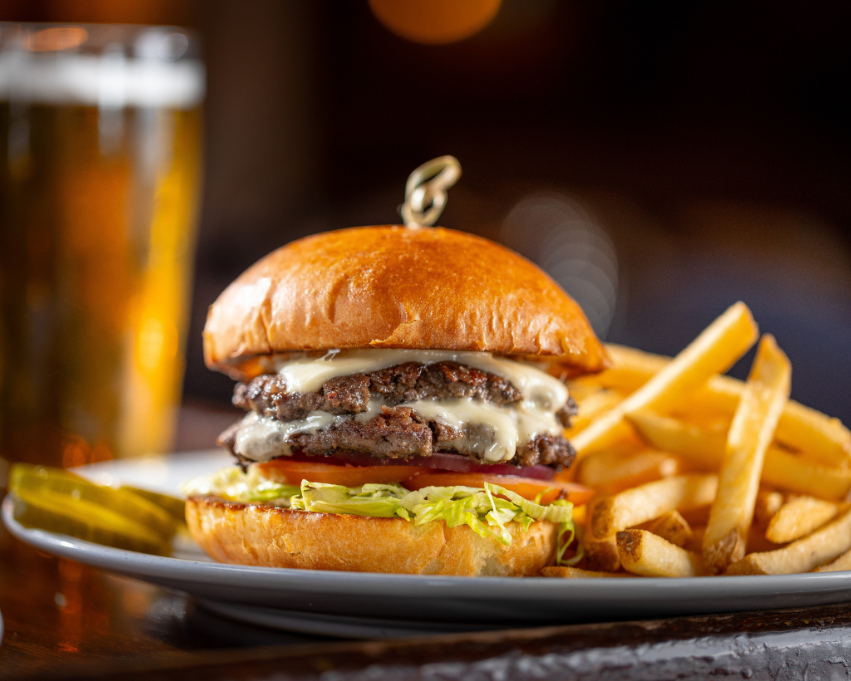 a burger and fries on a plate