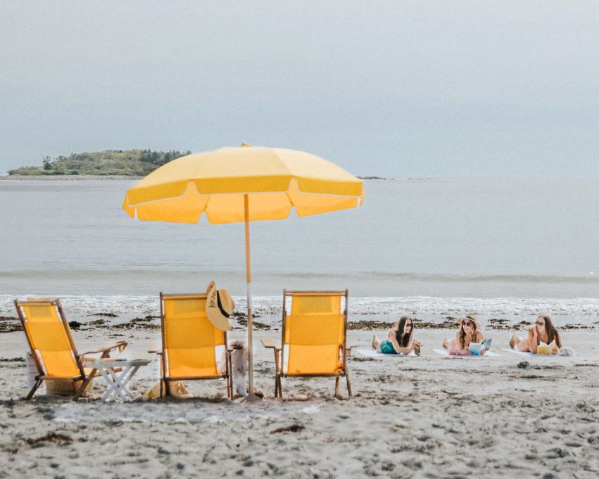 a group of people on a beach
