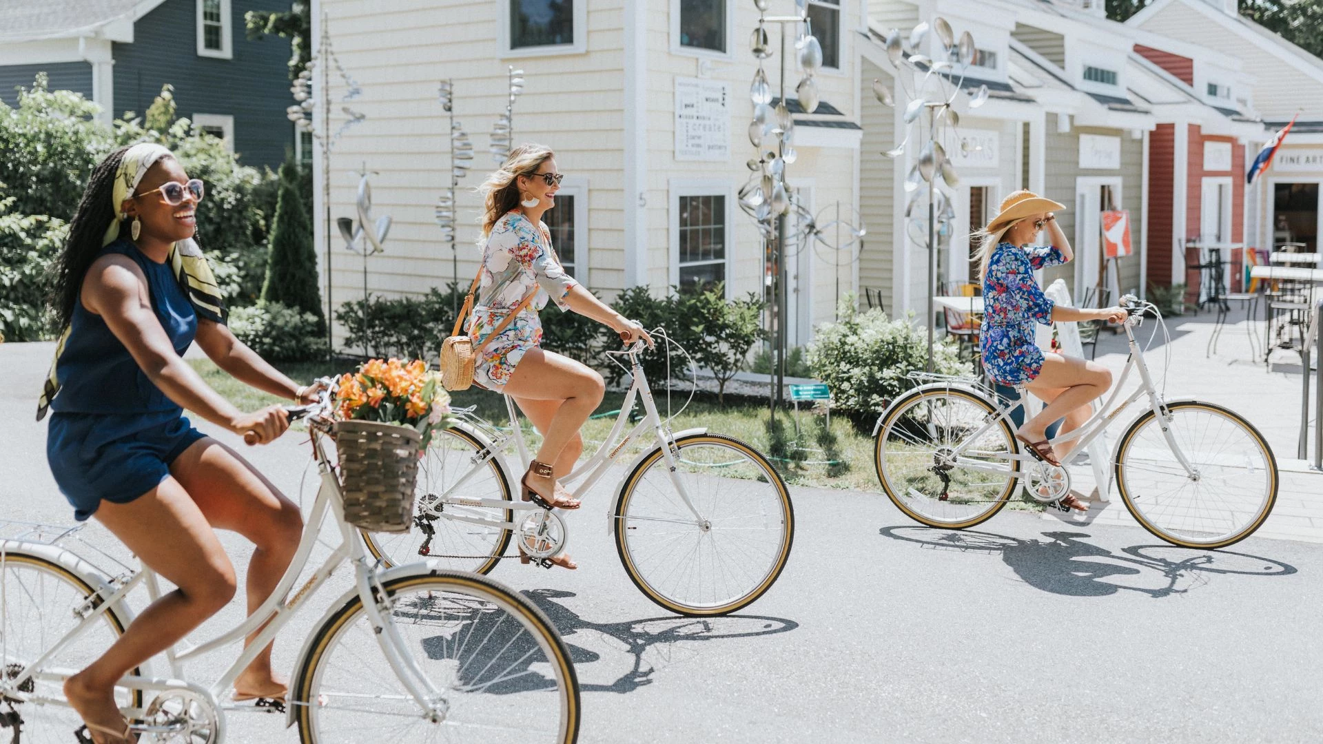 a group of women riding bicycles