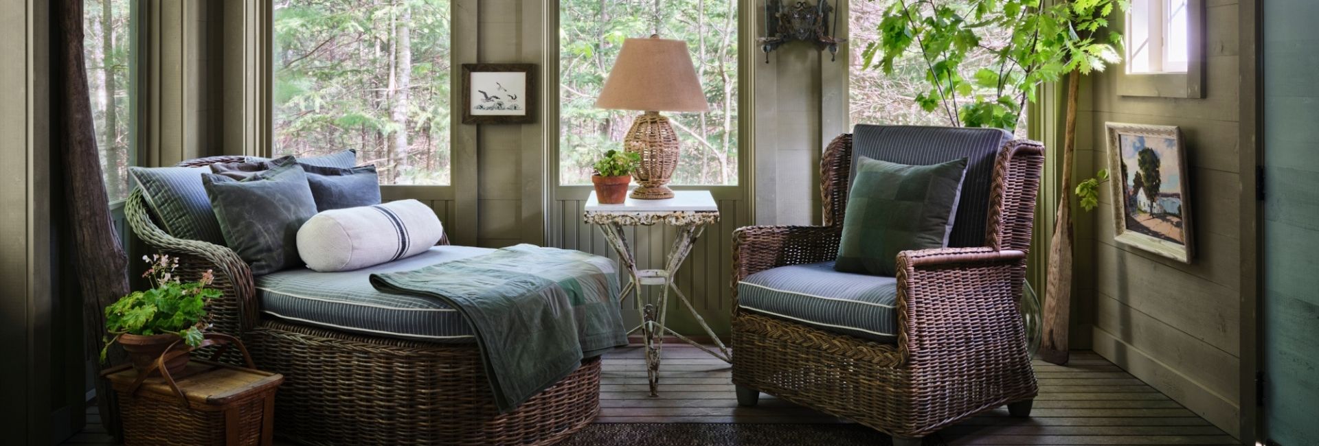 a room with wicker chairs and a lamp