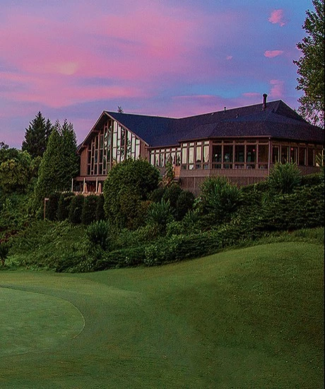 Exterior view of the property at sunset