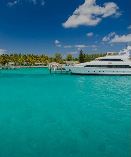 Icy sea and a luxury boat in a sunny day