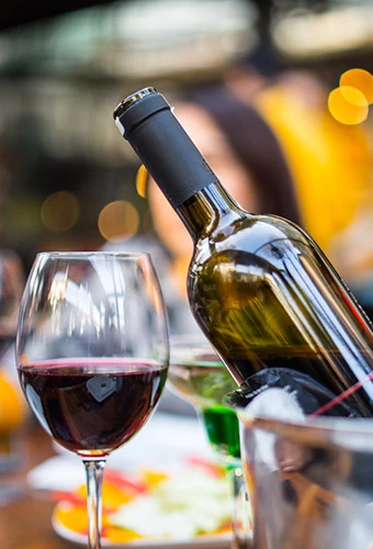 glass and bottle of red wine 