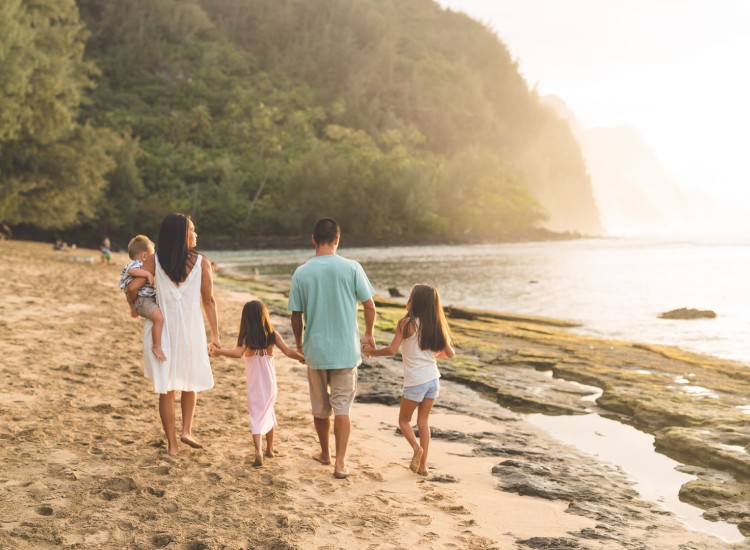 a family walking on a beach
