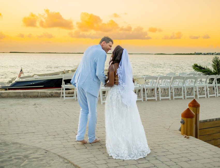 a man and woman in a wedding dress
