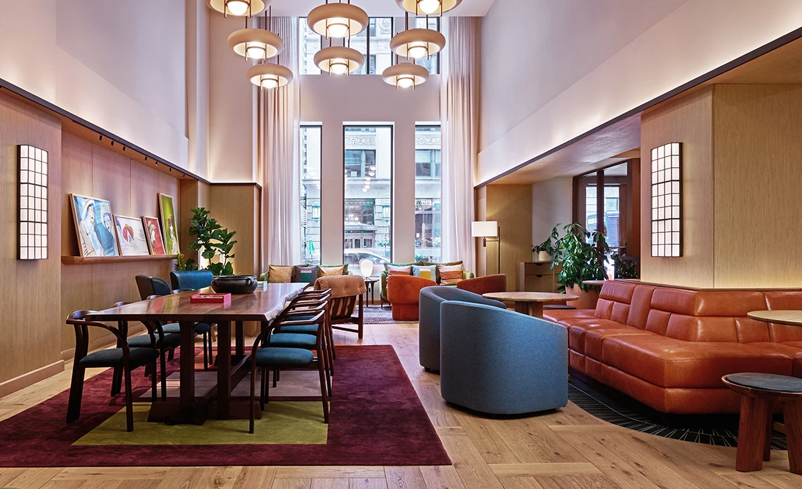 a room with a table and chairs