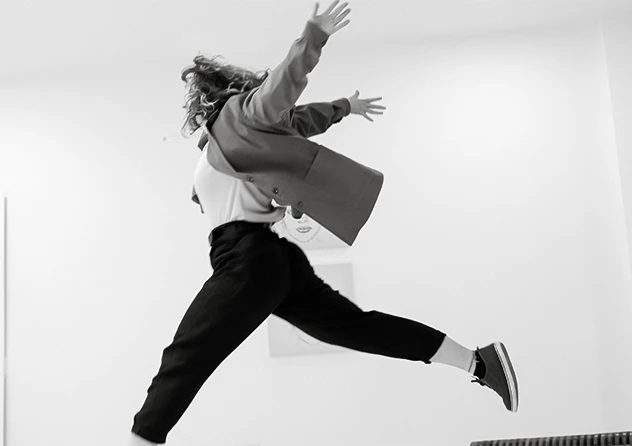 a woman jumping in the air