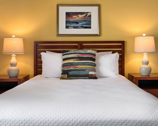 hotel bed with wood bed frame  picture 1