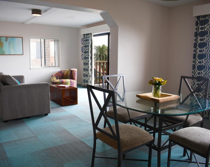 hotel room with separate dining and living room picture 2