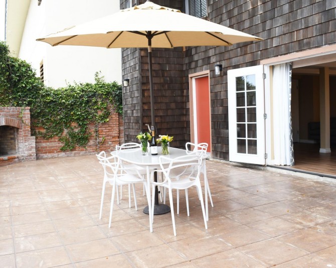 patio table with a yellow umbrella  picture 2