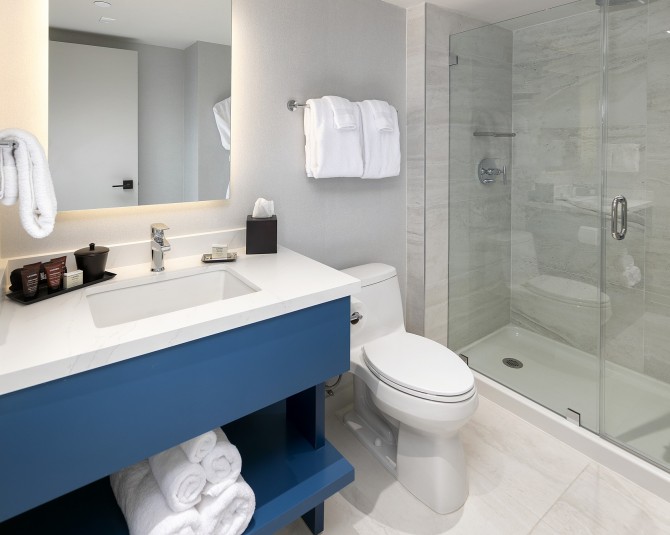 hotel bathroom with vanity and shower picture 4