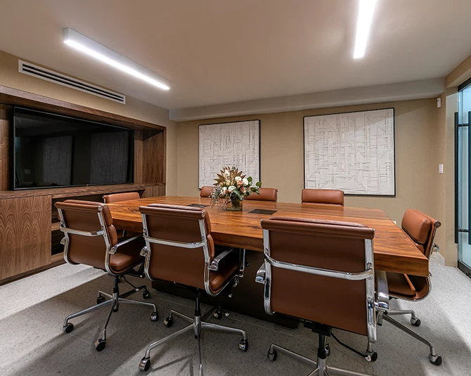 a room with a table and chairs