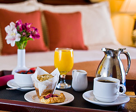 assorted pastries, coffee and orange juice